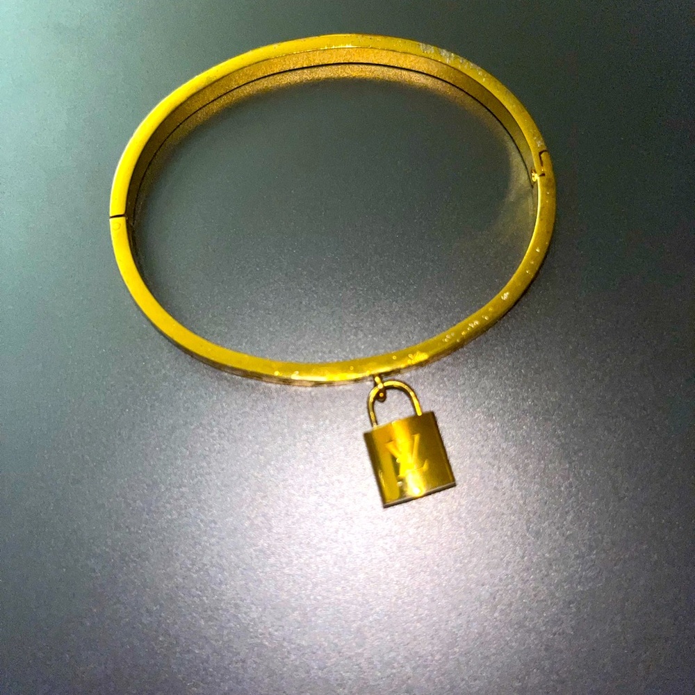 Gold Louis Vuitton Lock Dangle Bracelet With Original Box Never worn
